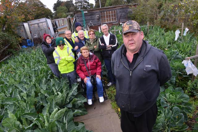 John Hays (foreground) and members of the Burn Valley Allotment & Security group prior to their eviction from the plot.