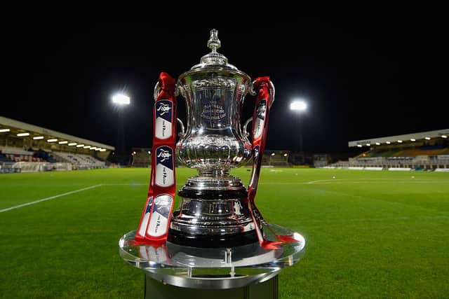 The FA Cup trophy on display at Victoria Park (Photo by Mike Hewitt/Getty Images)