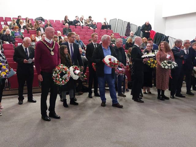 Guests prepare to lay wreaths at Workers Memorial Day at Hartlepool College of Further Education.