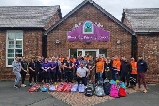 Kool 4 Skool packs being given to Blackhall Primary School by Findley Roofing and Building director, Grant Findley.