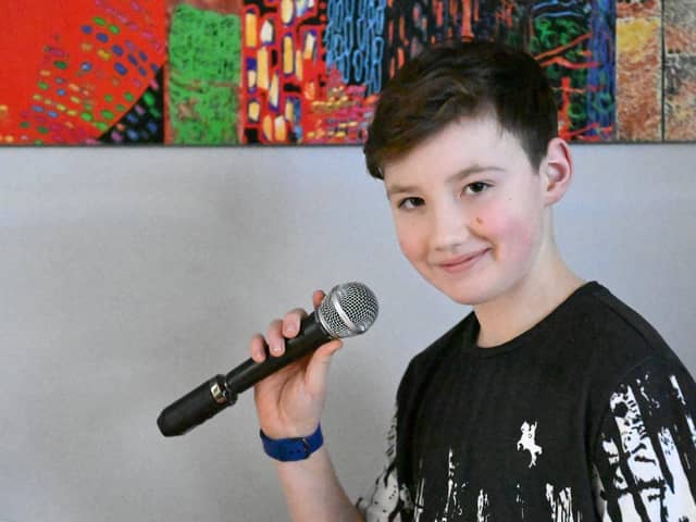 Singer Charlie Atchinson, aged 11, has raised over £10,000 for lots of local charities. Picture by FRANK REID