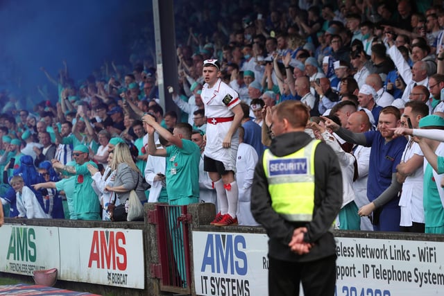 Hartlepool United fans dressed as doctors and nurses celebrate at the Sands Venue Stadium. (Credit: Mark Fletcher | MI News)