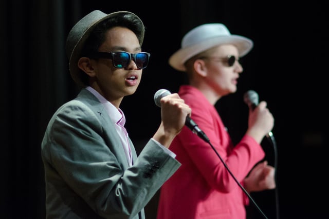 Year 9 student Allen Tan on stage in 2015. Does this talent show scene bring back memories?