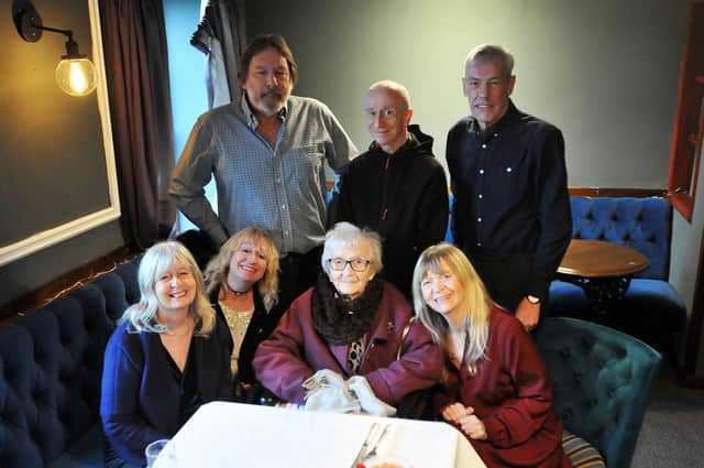 Hilda Maguire on her 100th birthday with, standing left to right, son-in-law Alan Harris, son Brian Maguire and son-in-law  Brian Peacock. Front, left to right, daughters Evelyn Harris, Irene Maguire and Sylvia Maguire. Picture and caption by FRANK REID