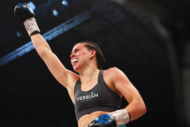 Savannah Marshall celebrates the defence of her WBO middleweight title. (Photo by Stu Forster/Getty Images)