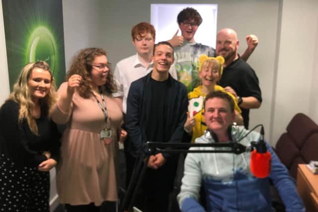 BBC Radio Tees presenter, Paul ‘Goffy’ Gough (front right) with the students and staff of Catcote Academy at the Centre of Excellence in Creative Arts in King Oswy Drive.