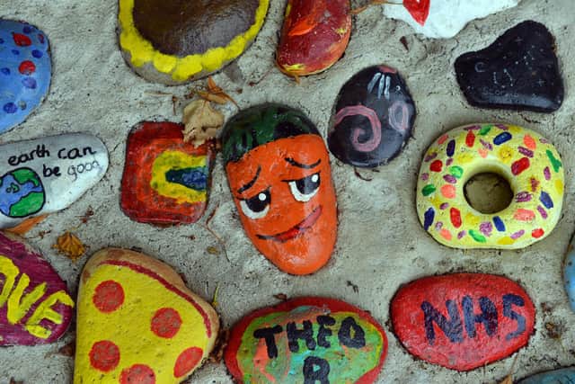 More of the pebbles and stones painted by villagers during the pandemic.