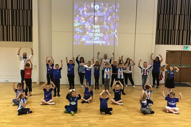 Jesmond Gardens Primary School staff and pupils celebrated Hartlepool United's promotion to the Football League by wearing kits on Monday.