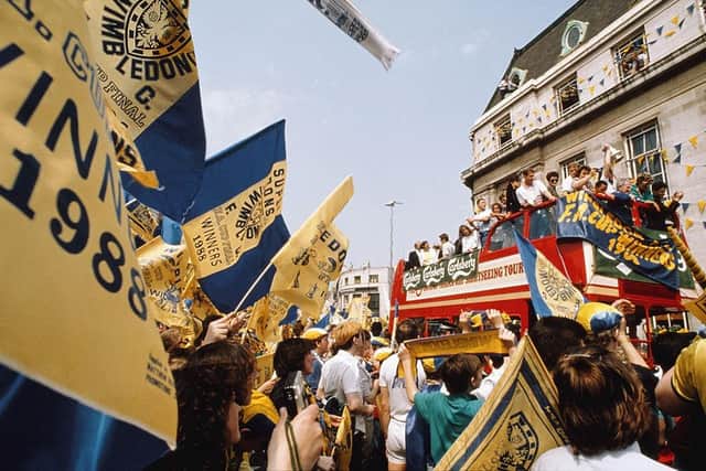 The Wimbledon team on their open top bus travel through their supporters after winning the 1988 FA Cup Final against Liverpool.  (Photo by Pascal Rondeau/Allsport/Getty Images)