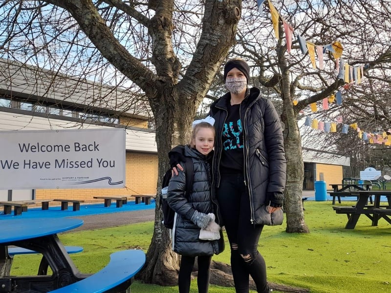 Mimi Harvey-Gutteridge, Year 4, with her mum Gemma arrive at Gomer Junior School.