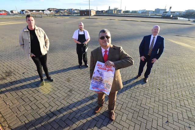 Darab Rezai (Hartlepool Licensees Association) holding a poster for the petition with (left to right) Jake Wiley (Hartlepool Eats), Kevin Reid (Harbour View) and Lee Pennick (Trinity Tea Rooms) at the former Jackson's Landing site, Hartlepool Marina. Picture by Frank Reid