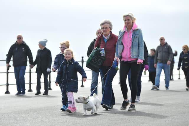 Walkers taking part in last year's Alice House Hospice Memory Stroll on the Headland.