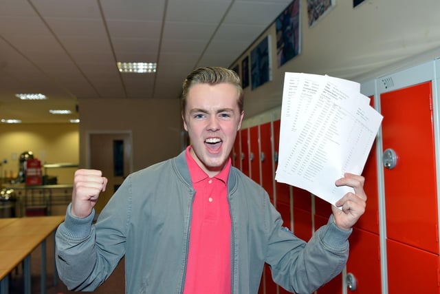 English Martyrs school pupil Adam Chatterton celebrates his GCSE results in 2014.