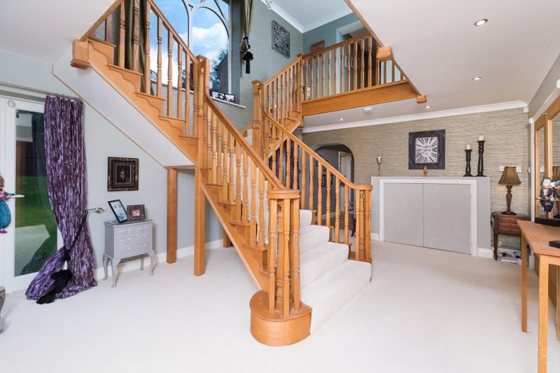 Upon entering the home, you are greeted with an impressive oak finished split staircase.