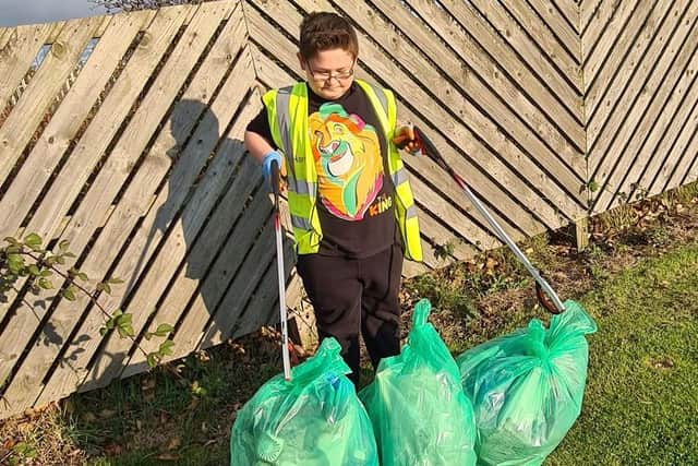 Harry Aylett whose litter picking efforts have given him a huge boost in confidence.