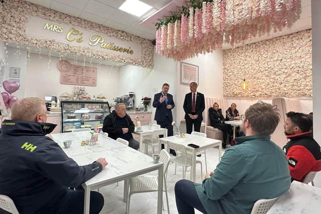 The pair meeting Hartlepool businesses in Mrs C's Patisserie.