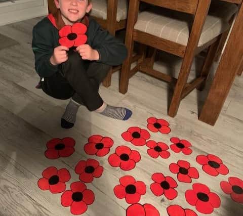 Harry with some of his poppies.