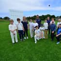 International cricket umpire and former England cricketer Michael Gough (kneeling) at High Tunstall College of Science with invited guests from Hartlepool Cricket Club, sponsors Lorimers and school cricket players.  Picture by FRANK REID