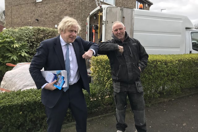 Kevin Richardson (right) with Boris Johnson in Mildenhall Close in April last year.