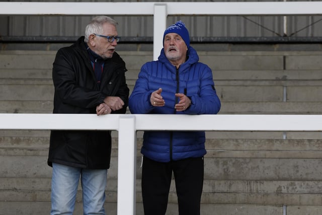 Two fans discuss the game. Photo: Mark Fletcher | MI News