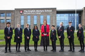 English Martyrs School and Sixth Form College headteacher Sara Crawshaw with pupils following Ofsted's latest visit to monitor their progress.