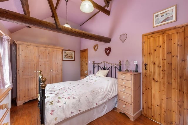 The bedrooms of the home enjoy beautiful countryside views.