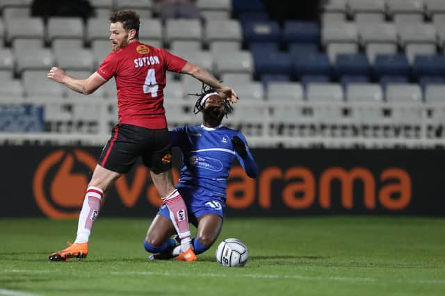 Hartlepool United's Claudio Ofosu in action with Altrincham's Ritchie Sutton during the Vanarama National League match between Hartlepool United and Altrincham at Victoria Park, Hartlepool on Tuesday 27th October 2020. (Credit: Mark Fletcher | MI News)