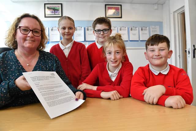 Rossmere Academy, in Catcote Road, Hartlepool, received a positive Ofsted report following its inspection in January. Pictured is head teacher Caroline Reed and pupils Joshua, Emmi, Arabella and Aaron.