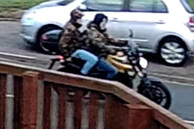 Police are keen to speak to the two individuals on the yellow motorbike.