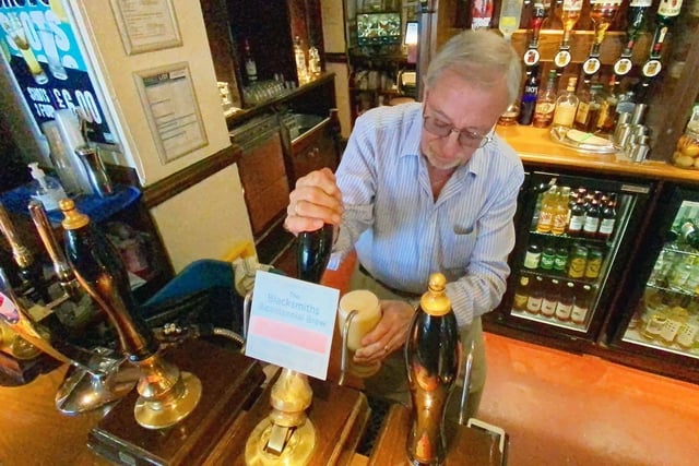 Landlord David Mountney was pictured pulling a pint of the bicentennial beer at the pub in 2021.