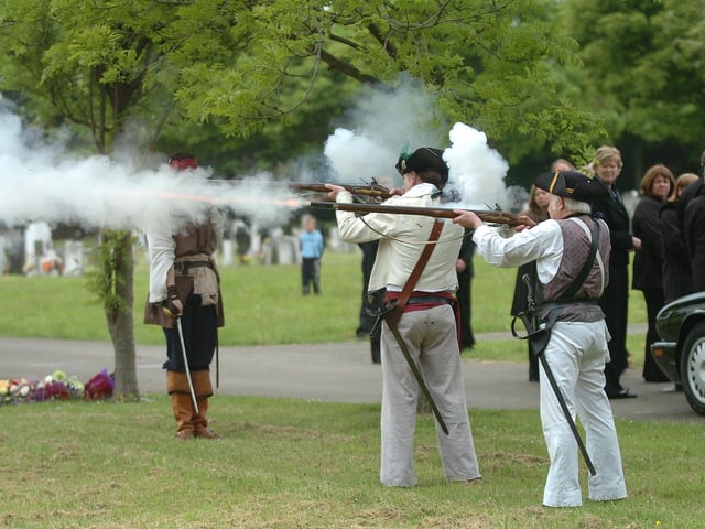 A funeral with a difference as muskets are fired in salute to a history enthusiast in West View Cemetery in 2008.