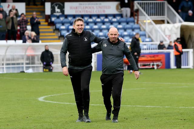 Hartlepool United manager Dave Challinor and Physio Ian Galagher  during the Sky Bet League 2 match between Hartlepool United and Harrogate Town at Victoria Park, Hartlepool on Sunday 24th October 2021. (Credit: Mark Fletcher | MI News)