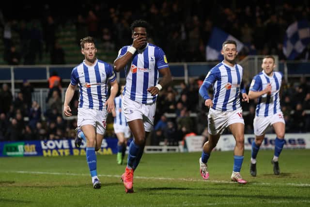 Omar Bogle celebrates after scoring Hartlepool United's third goal during the Sky Bet League Two match with Barrow. (Credit: Mark Fletcher | MI News)