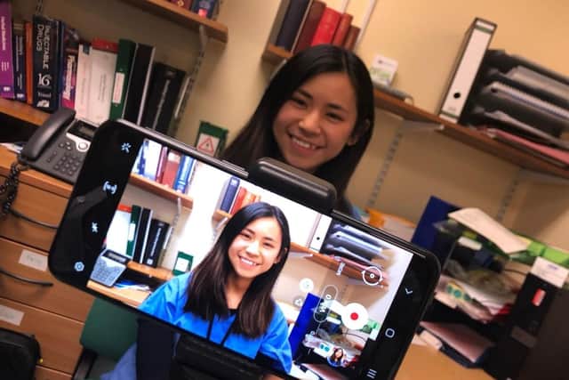 Pharmacist Esther Cheung, originally from Hong Kong recording her message in Cantonese.