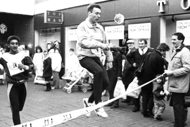 Frank Blair wins the 1990 pancake day race.