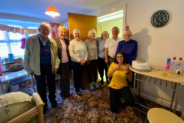 Florence enjoys her 100th birthday with lots of relatives to share her big day.