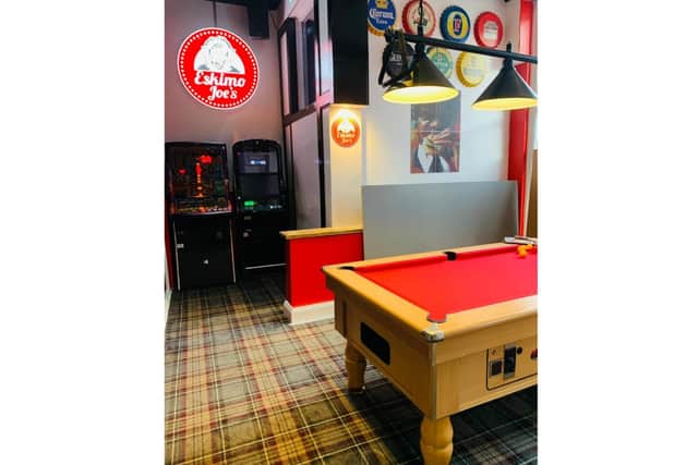 There are pool tables and arcade machines at the new bar./Photo: Joe Franks
