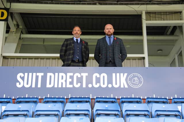 Hartlepool United COO Stephen Hobin (right) alongside Suit Direct's CFO Nick Scott (left). Hartlepool United's stadium has recently been rebranded as The Suit Direct Stadium.