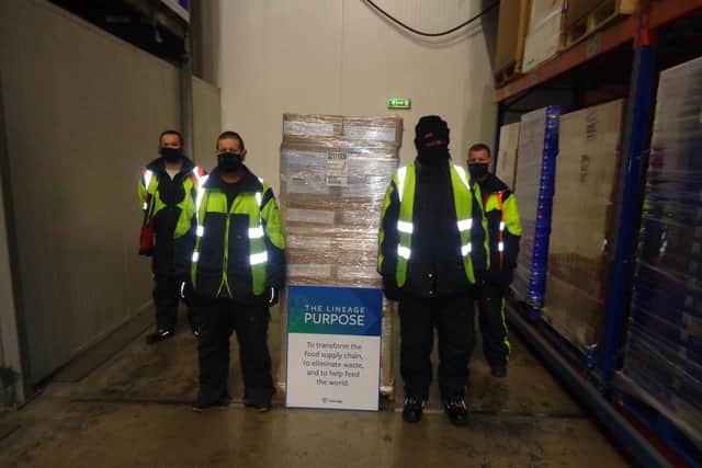 Lineage Logistics Seaham with boxes of the frozen pies that are to be distributed among Hartlepool food projects.