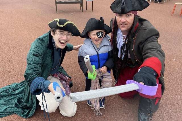 Scallywag entertainers Tom Roberts and Captain Andy Brown teach some sword skills to Jacob Thurston (aged five) at the Heugh Gun Battery during the Queen's Jubilee celebrations at the Headland. Picture by FRANk REID