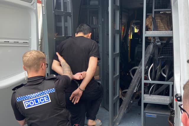 A suspect is taken into custody in Dent Street, Hartlepool. Picture by FRANK REID