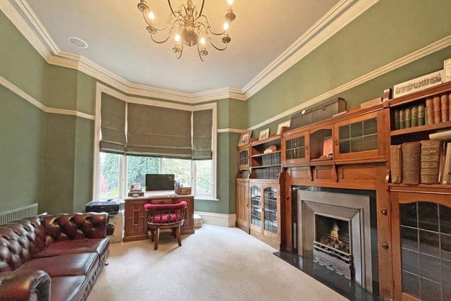 The study boasts Edwardian furniture and a Chesney fireplace. Picture: Rightmove.