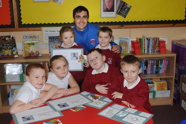 Evan Horwood, of Hartlepool United, is pictured alongside primary school pupils from left, Ella Gibson, Brooke Halse, Maisy Henderson, Matthew Moss, Adam Woodall and Lewis Cann in 2013.