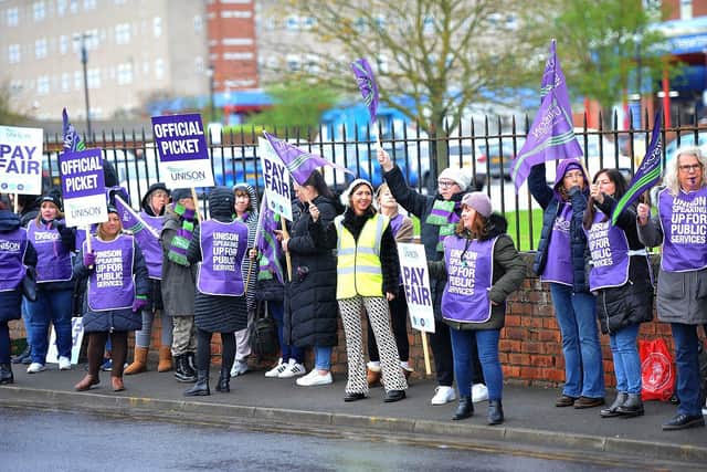 UNISON members stand at the picket line outside The University Hospital of Hartlepool in an open dispute over pay. UNISON claims most healthcare assistants - on band 2 pay - have routinely undertaken clinical tasks that are normally done by those on band 3, such as taking blood and inserting cannulas.
