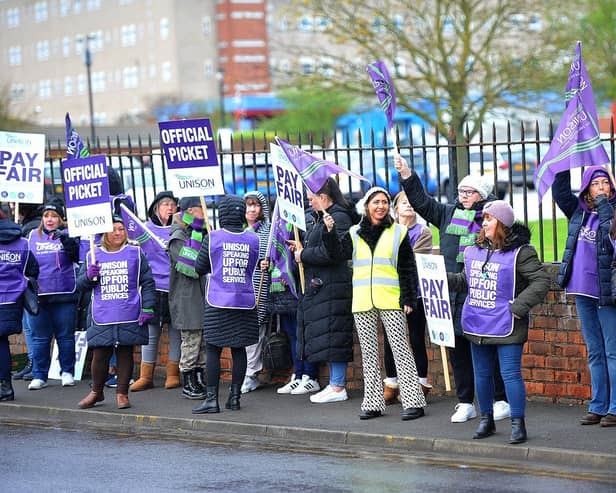 UNISON members stand at the picket line outside The University Hospital of Hartlepool in an open dispute over pay. UNISON claims most healthcare assistants - on band 2 pay - have routinely undertaken clinical tasks that are normally done by those on band 3, such as taking blood and inserting cannulas.