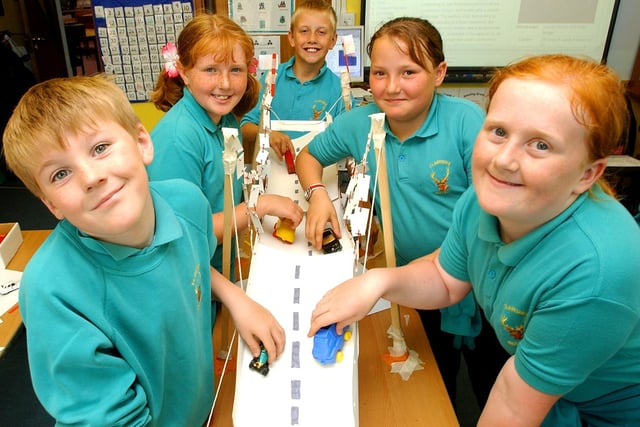 Pupils take part in a bridge building exercise in 2006.