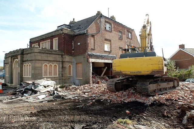 The bulldozers moving in on the Brus Arms in 2009. Did you enjoy a pint there?