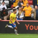 Goalkeeper Lucas Covolan celebrates scoring Torquay United's equaliser during the Vanarama National League play-off final match between Hartlepool United in 2021.
