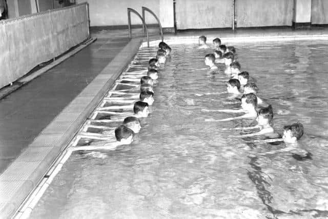 Learning to swim at Seaton Baths.