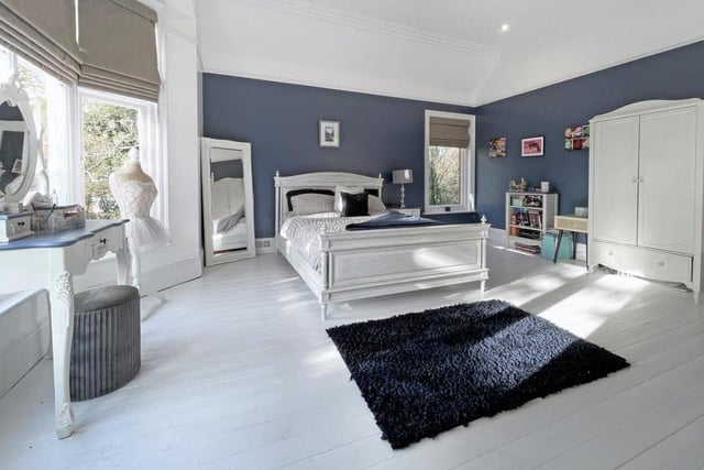The bedroom is flooded with light and boasts a separate dressing room. Picture: Rightmove.